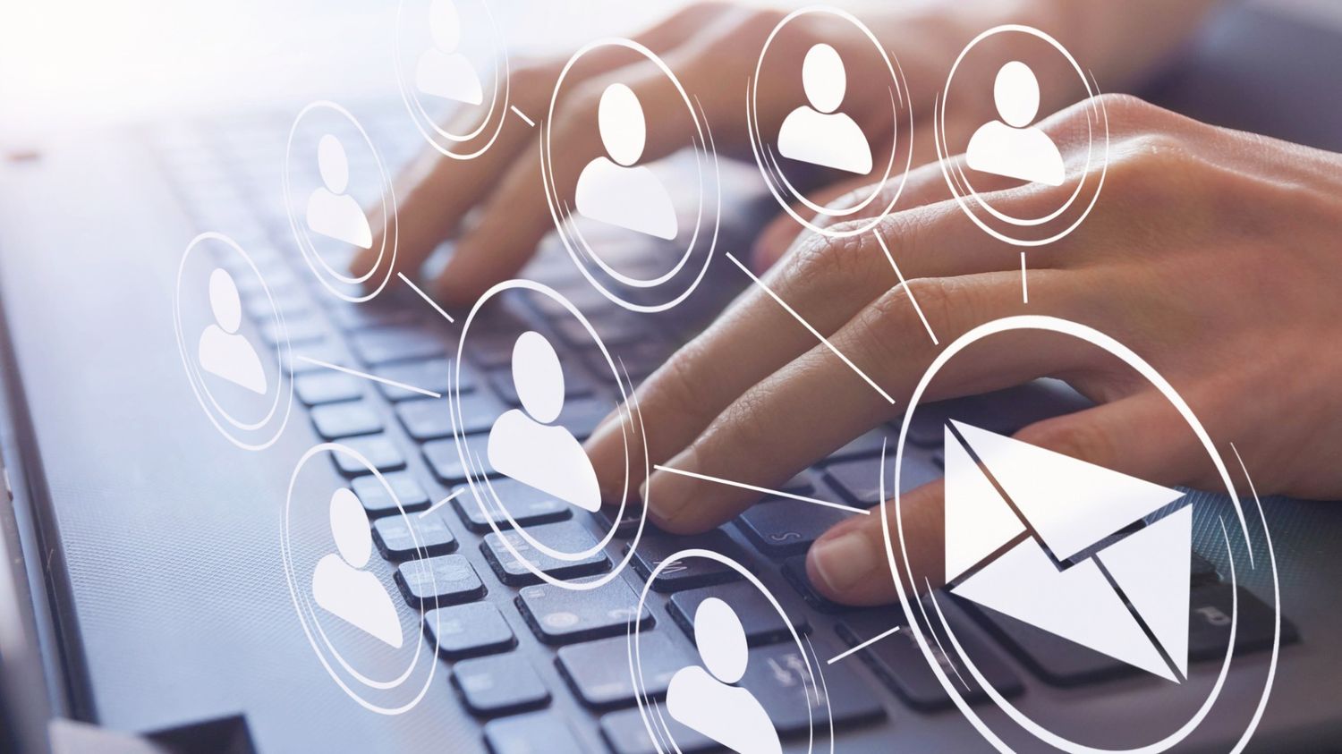 A person's hands typing on a laptop keyboard with a digital overlay of an envelope icon and a network of interconnected user profile icons, representing digital marketing and email outreach strategies.