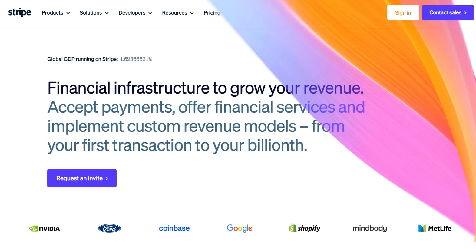 Stripe homepage showing its financial infrastructure platform for online payments, featuring the headline about accepting payments and growing revenue, with a colorful gradient design, navigation menu, call-to-action button, and logos of companies including NVIDIA, Ford, Coinbase, Google, Shopify, Mindbody, and MetLife.