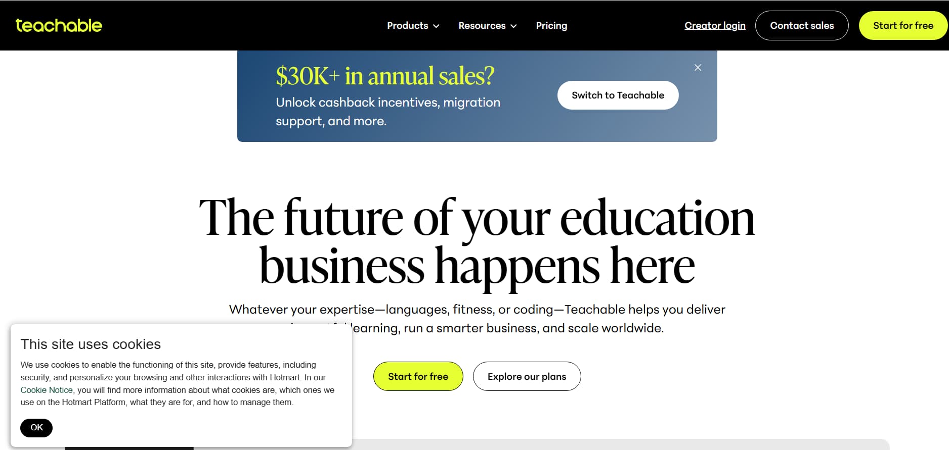 Teachable homepage featuring the headline “The future of your education business happens here”, with a blue promotional banner, navigation menu, “Start for free” and “Explore our plans” buttons, and a cookie consent popup in the lower-left corner.