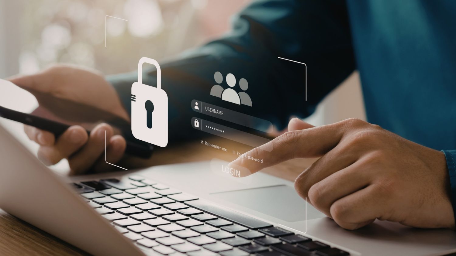 Close-up of hands working on a laptop, interacting with a floating digital interface that displays a secure login screen, featuring a large padlock, a team user icon, and username and password fields.