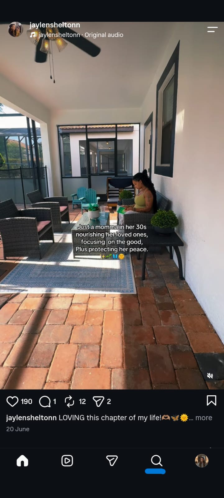 Instagram Reel showing a woman sitting on an outdoor patio reading a book beside potted plants and wicker furniture. The video includes an inspirational text overlay about embracing life in her 30s, focusing on loved ones, gratitude, and protecting her peace. The Instagram interface displays the reel's likes, comments, shares, and caption below the video.
