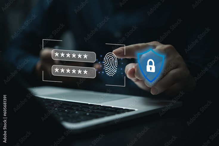 A person working on a laptop with glowing digital security icons, including password fields, a fingerprint scanner, and a protective shield.