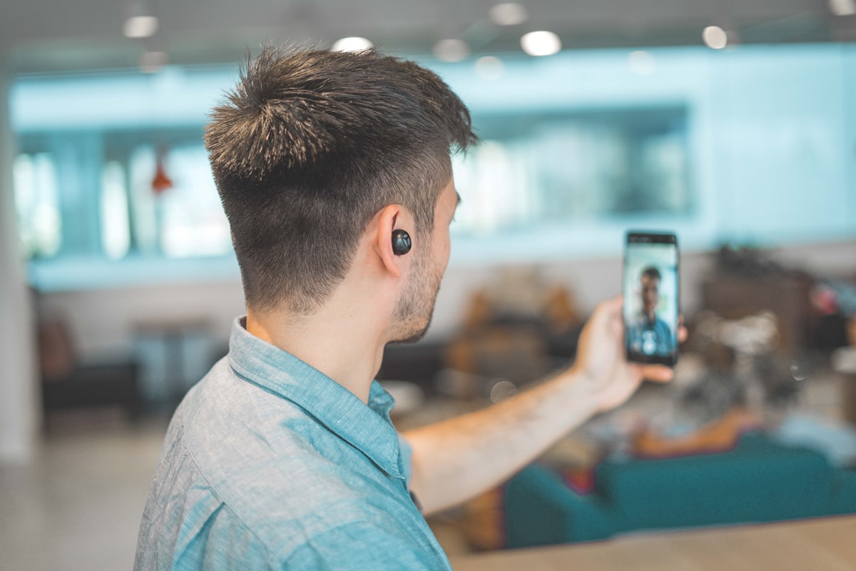 Creator recording a talking head video with a phone