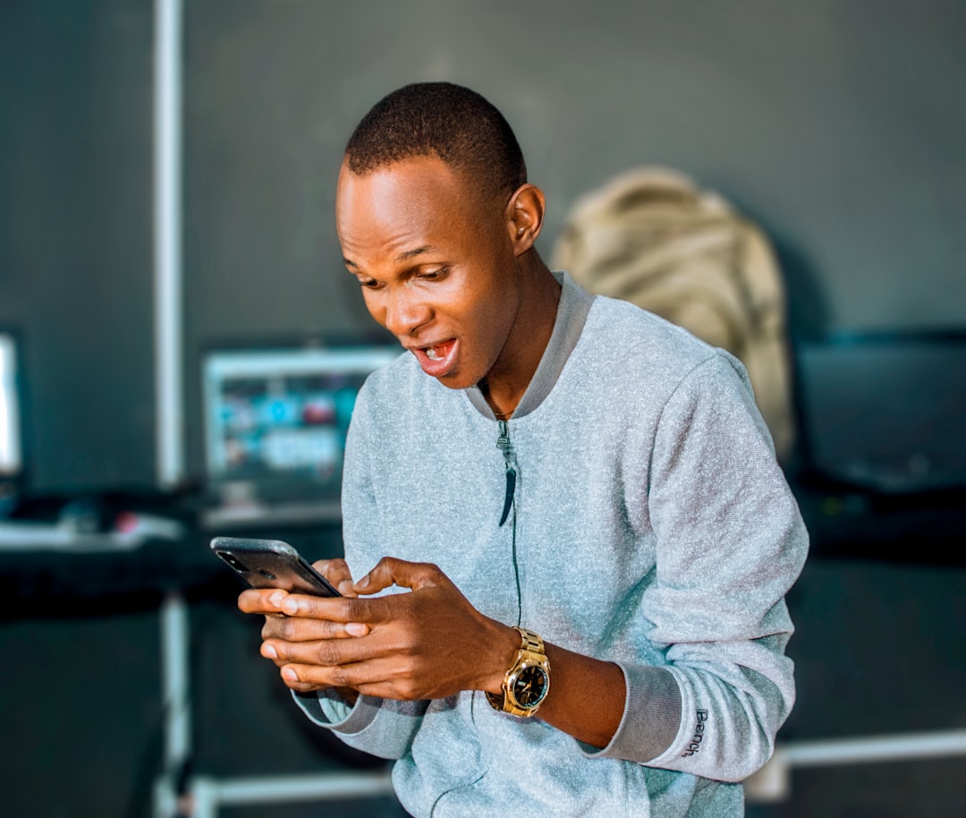 Person reacting to viral content on their phone