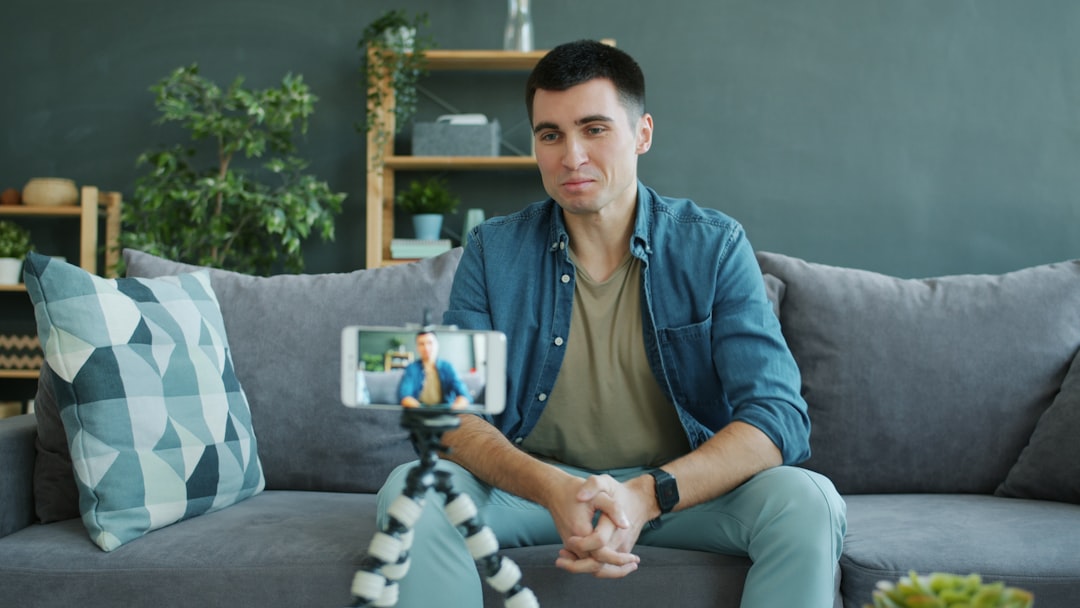 Content creator analyzing Instagram growth metrics on phone