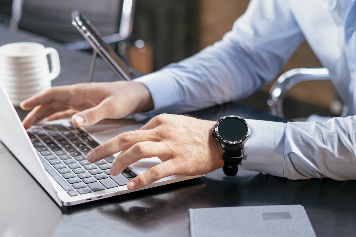 Social media manager working on documents